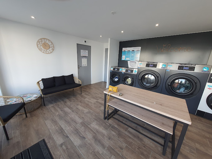 Machine à laver cozy laverie